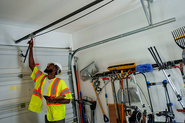 Professional Garage Door Panel Replacement technician working in Central City, NE